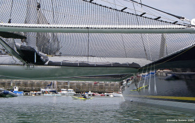 Birgit also paddlingunder a very large catamaran