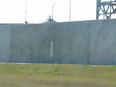 Repaired levee wall, dark grey area denotes area of original levee breach in August 2005