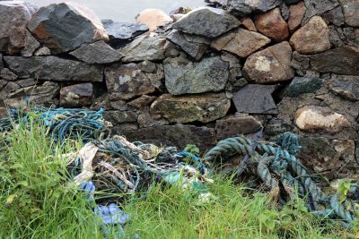 Grass, rope and a stone wall