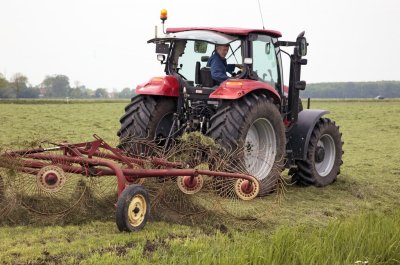 Tractor doing hay