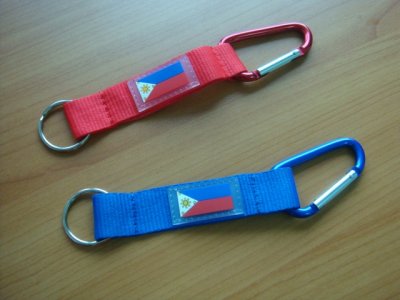 blue and red carabiner tags