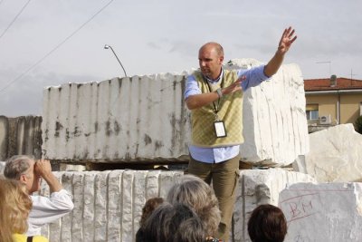 76.  Umberto leading the chorus at Carrarra.