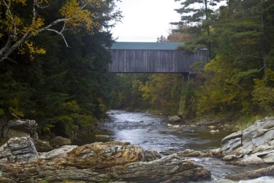 15.  The covered bridge below the grist mill