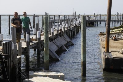 11.  The first finger piers are knocked down.
