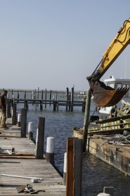 13.  Pulling out a piling.