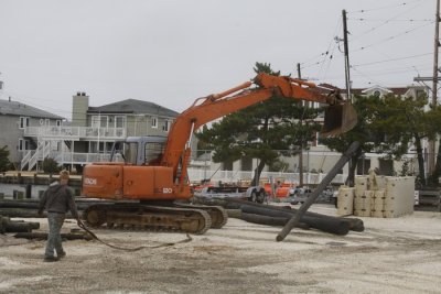 19.  Staging the creosoted pilings.