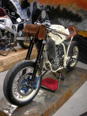 Two wheels, a motor and a leather pouch