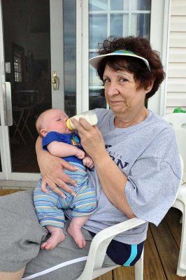 Baby + bottle = contented Auntie Maureen