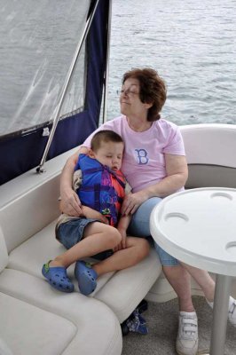 Andrew snoozes with Grandma Nancy on the pooped deck