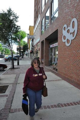 Judy walks in downtown Manchester