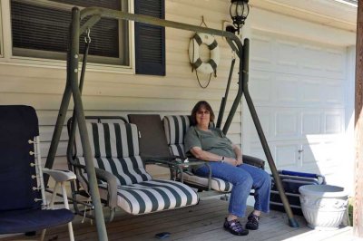 Judy relaxing on the front porch
