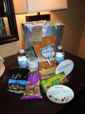 A beautiful snack bag and warm greeting await us at our hotel