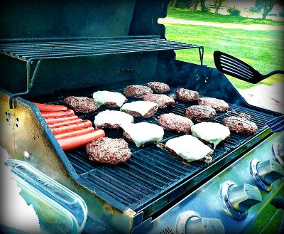 burgers and dogs on the grill
