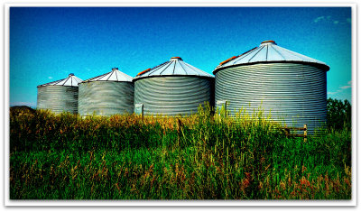 4 circular buildings in the morning light