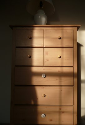 afternoon light on chest of drawers