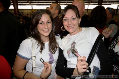 Republican voters show off their hand-made Sarah Palin T-Shirst and lipstick