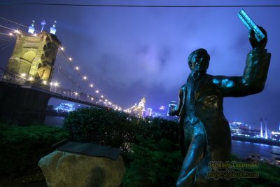 Roebling Suspension Bridge and statue of him at Night
