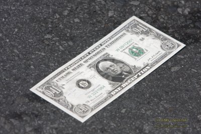 Dick Cheney dollar at the 2008 Pride Parade