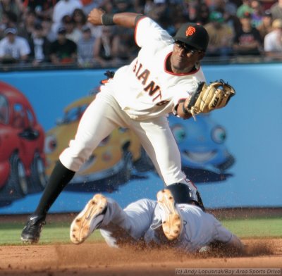 San Francisco Giants' Emmanuel Burriss forces out New York Mets' David Wright