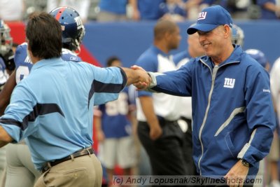 The head coaches: Tennessee's Jeff Fisher and NY's Tom Coughlin