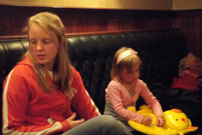 Sara and Chloe or Calista patiently waiting for dinner