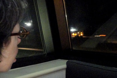 Night time in the sunroom at hotel looking at highway construction crews on Rte 422