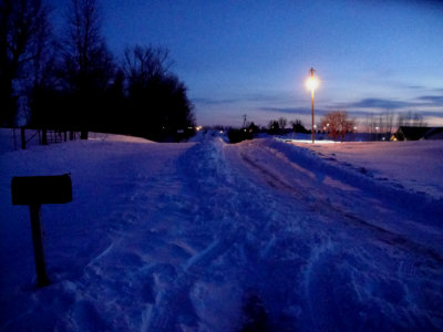 Plowed street from our mailbox (left) out towards highway. (See summer view,same shot, in Iowa Gallery.)