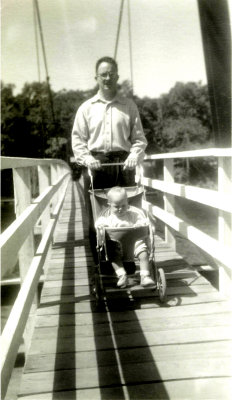 Dad pushing Mike across bridge in 1952