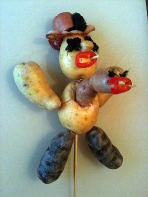 potato pilgrim with emerging alien