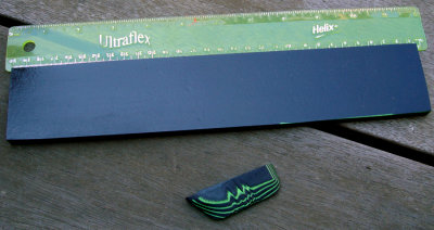 #144 Black Textile & UV reactive Green Paper