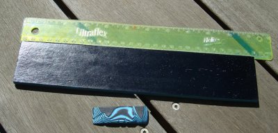 #148 Black Textile and Blue Paper