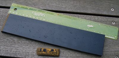 #167 Black Textile & Orangish Paper
