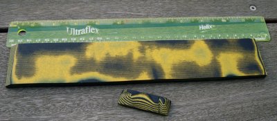#171 UV Reactive Yellowish Paper & Black Textile