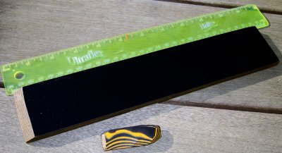 #179 Black Textile & Yellow/Orange Paper