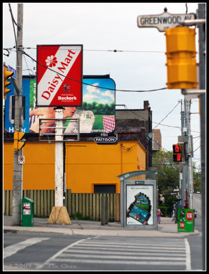 Signs at the corner of Greenwood & Gerrard