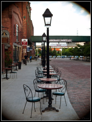 Empty Tables and Lamp Post