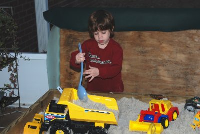 It's a good thing that Santa knew Carter wanted a sand box for Christmas