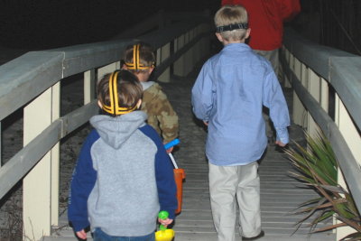 Papa Fred and the crab hunters head down the boardwalk