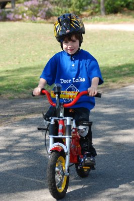 Carter and Brooks riding without training wheels