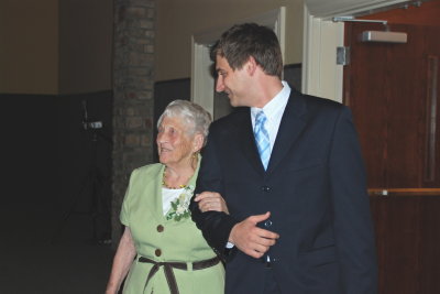 Nanny being escorted in