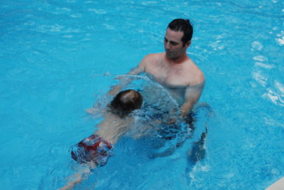 Jamison swimming to Dad