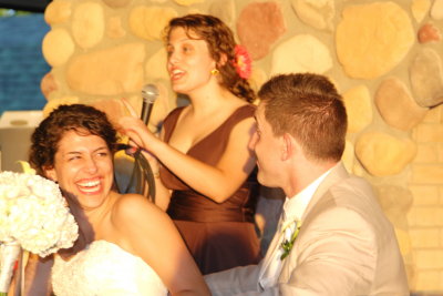 Laura toasts the newlyweds