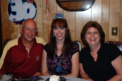 The birthday girl with her parents