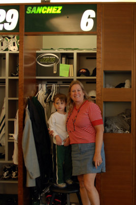 Judy and Tyler in front of Mark Sanchez's locker