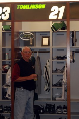Mike in front of Tomlinson's locker