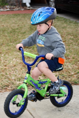 Maddox rides without training wheels
