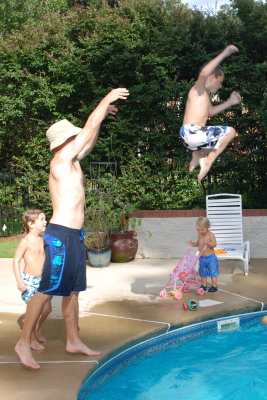 Jon throwing Carter into the pool