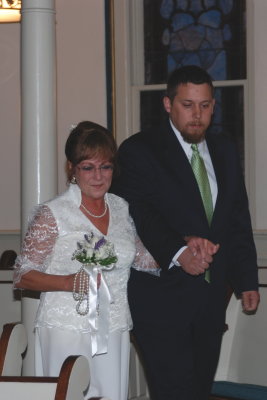 Here comes the bride, escorted by Jason (Cathy's son-in-law)