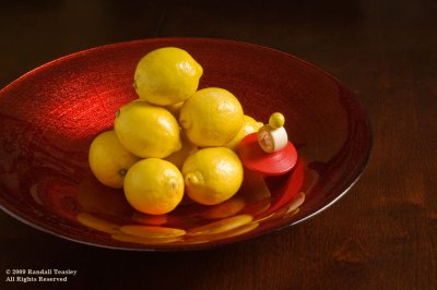 Red Bowl With Lemons