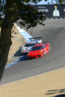 Robertson Ford GT and Risi Ferrari fight over real estate in the Corkscrew